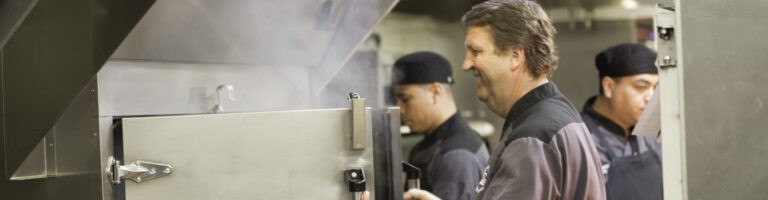 chef in kitchen at Q39